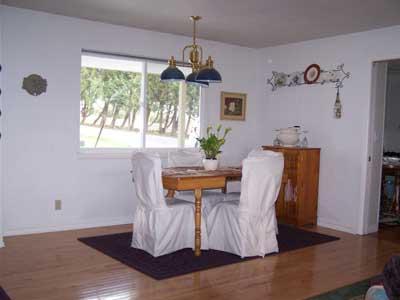 12202 Summitview Ext Road Yakima, WA 98908 - Photo 7 of 19 a living room with furniture and a chandelier