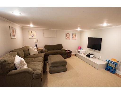 19 Fairview Road Weston, MA 02493 - Photo 16 of 20 a living room with furniture and a flat screen tv