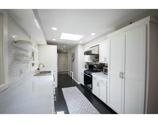 19 Fairview Road Weston, MA 02493 - Photo 4 of 20 a kitchen with refrigerator and cabinets