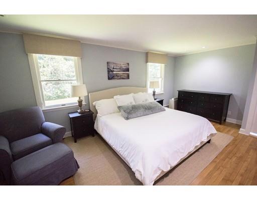 19 Fairview Road Weston, MA 02493 - Photo 10 of 20 a bedroom with a bed a couch and window