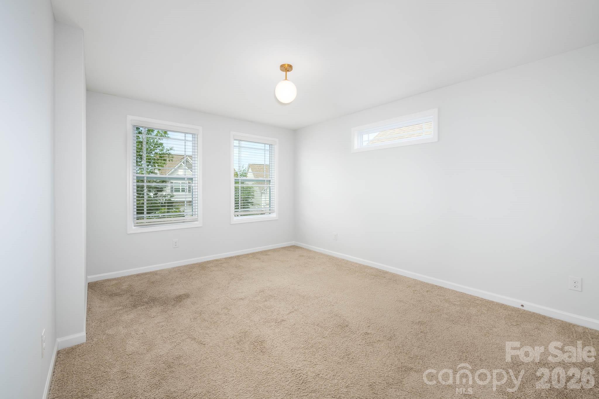 108 Chance Road Mooresville, NC 28115 - Photo 22 of 37 an empty room with windows