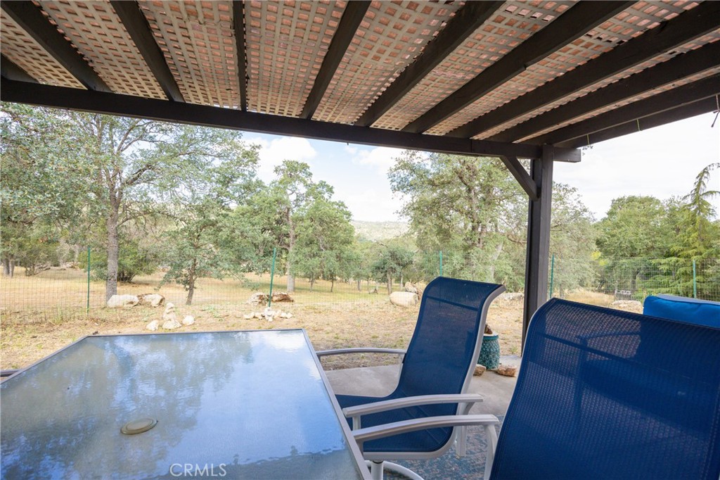 30142 Revis Road Coarsegold, CA 93614 - Photo 30 of 43 a view of a two chair in the balcony