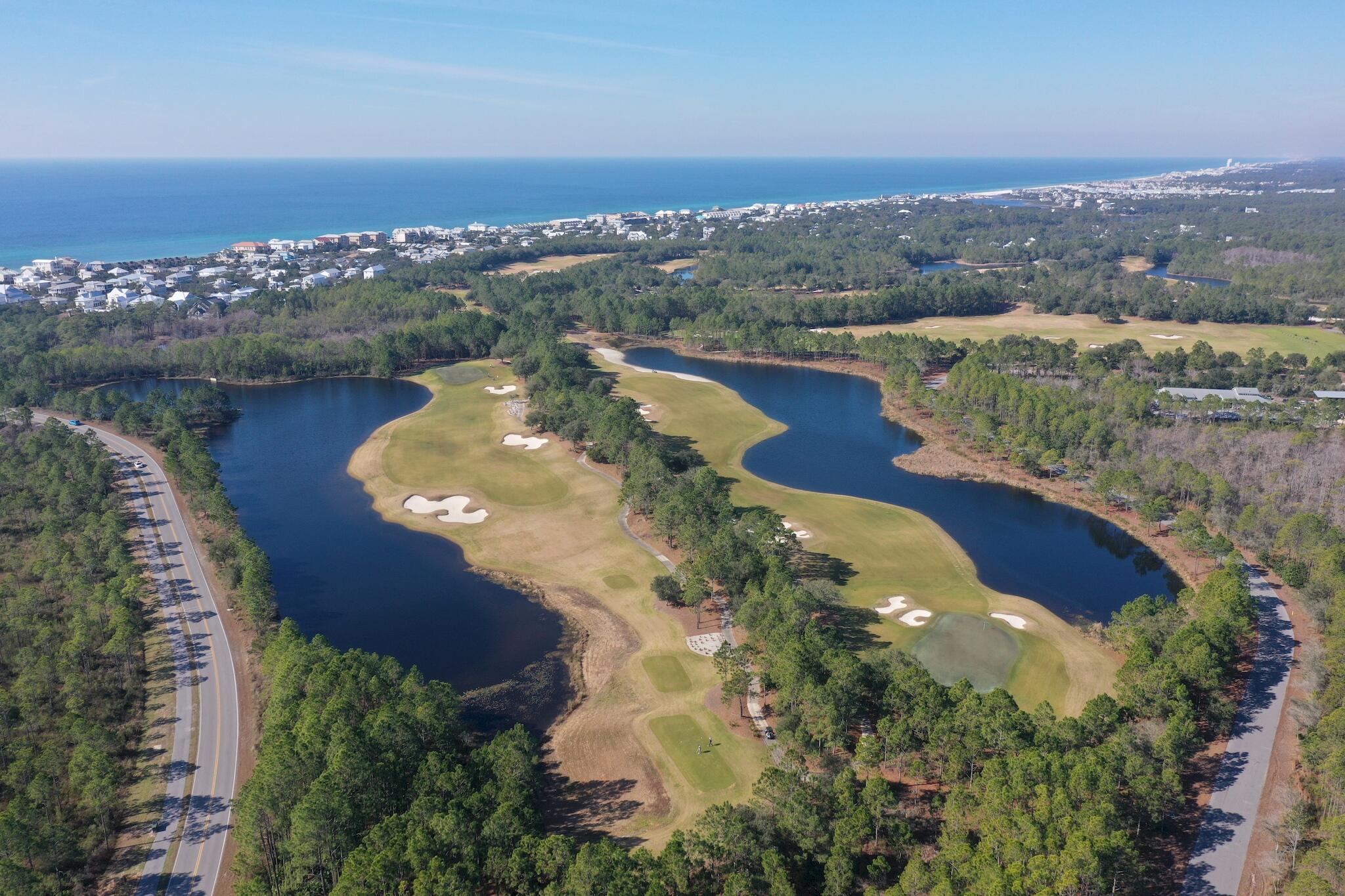 Lot 186 Windsong Dr Inlet Beach Inlet Beach, FL 32461 - Photo 1 of 1 an aerial view of a house with a lake view