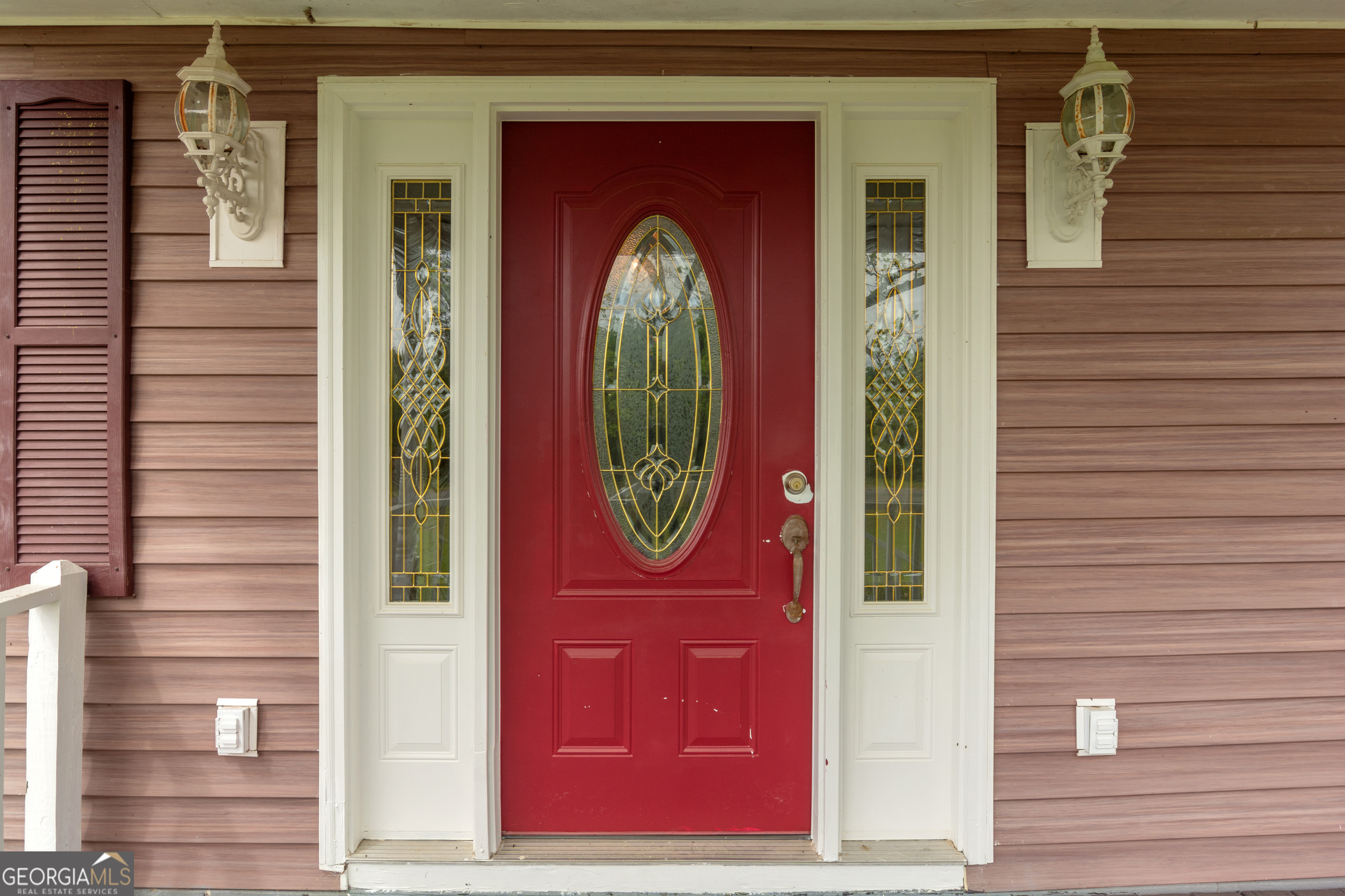 2010 Page Road Harrison, GA 31035 - Photo 17 of 59 a front view of a house with a door