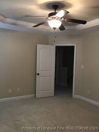 a view of a livingroom with a ceiling fan