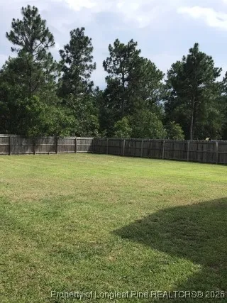 a view of a large yard with a small yard