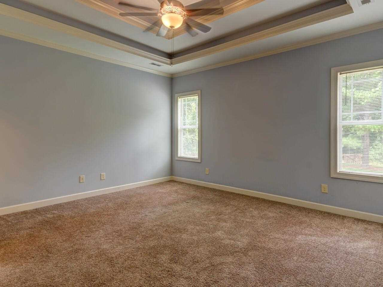 2195 Matthews Road Clayton, NC 27520 - Photo 13 of 30 Master Bedroom with Trey Ceiling