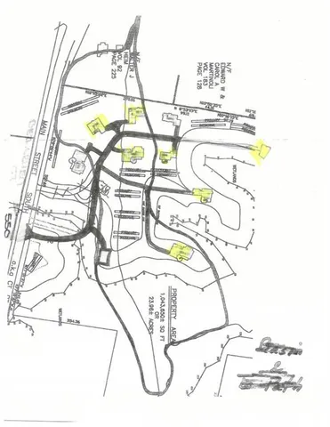 a picture of a room with a table and chairs