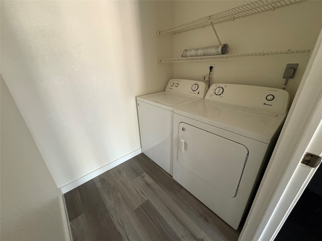 1128 Orchard Park Circle Pflugerville, TX 78660 - Photo 7 of 14 a utility room with dryer and washer