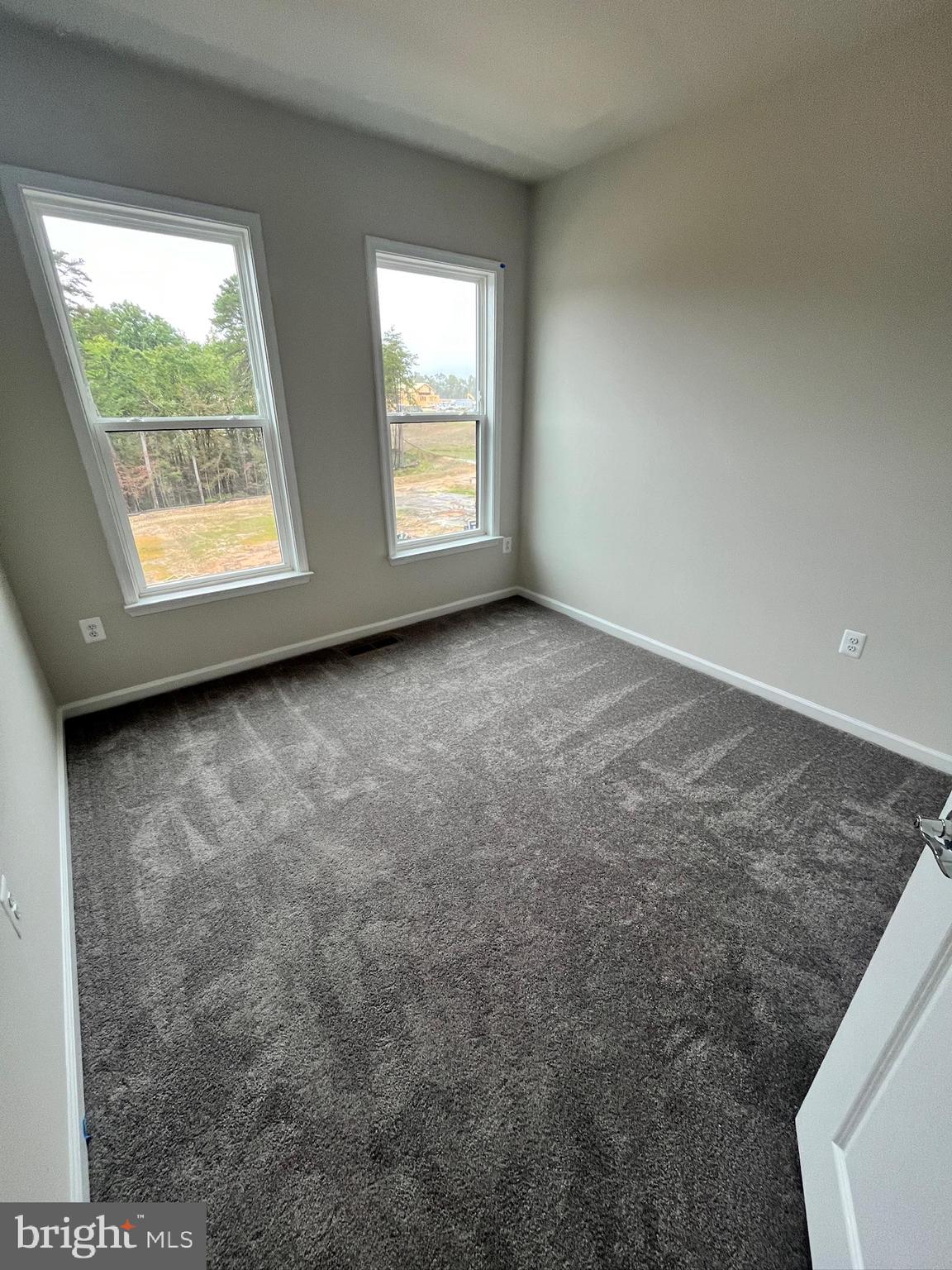 236 Mainstream Drive Laurel, MD 20724 - Photo 28 of 52 an empty room with windows