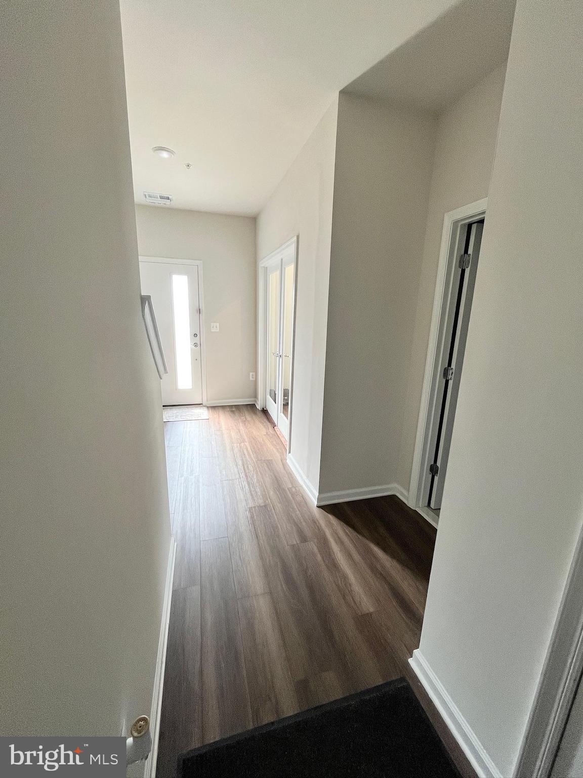 236 Mainstream Drive Laurel, MD 20724 - Photo 31 of 52 wooden floor in an empty room with a window