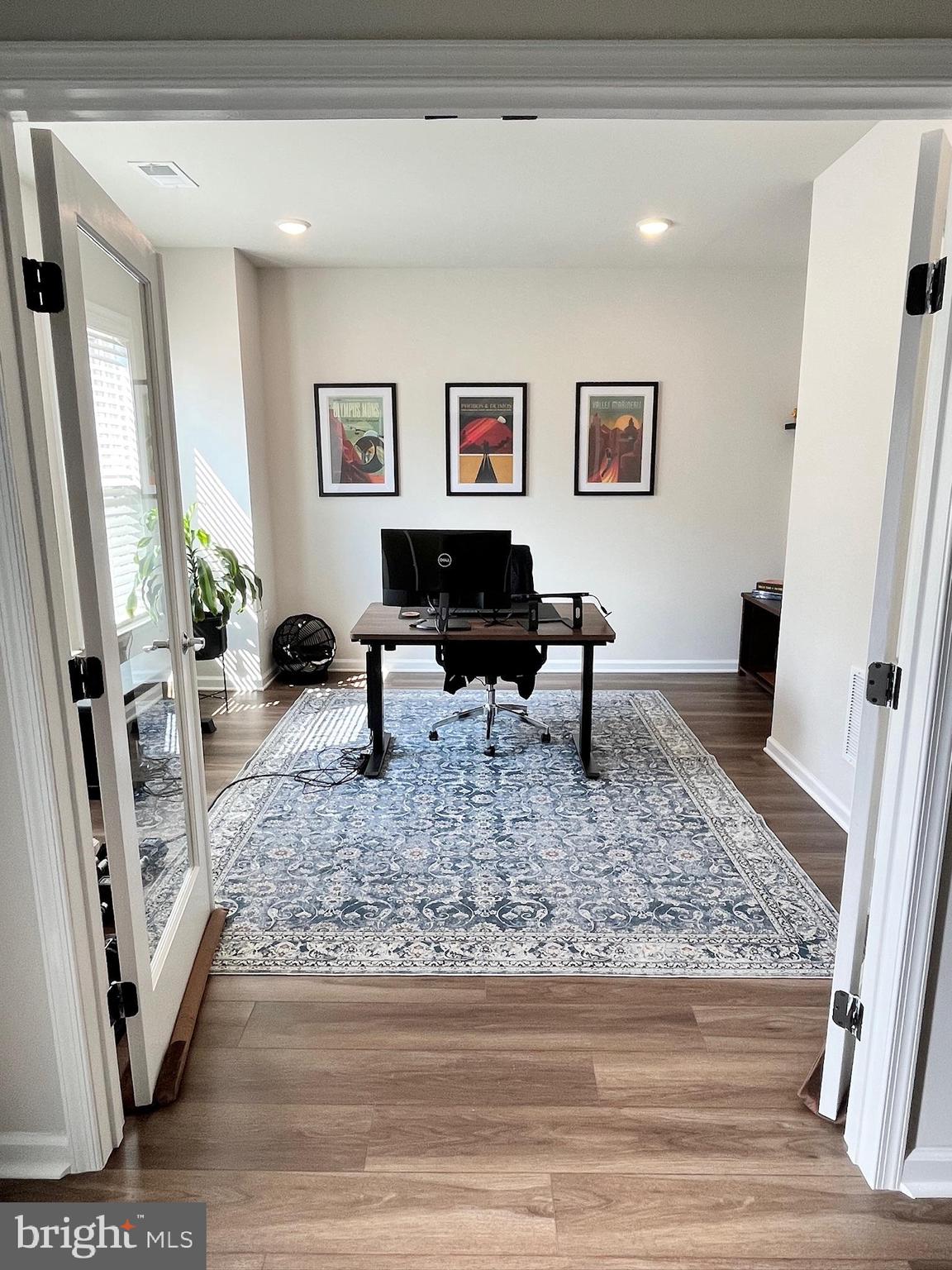 236 Mainstream Drive Laurel, MD 20724 - Photo 36 of 52 a living room with furniture and a rug