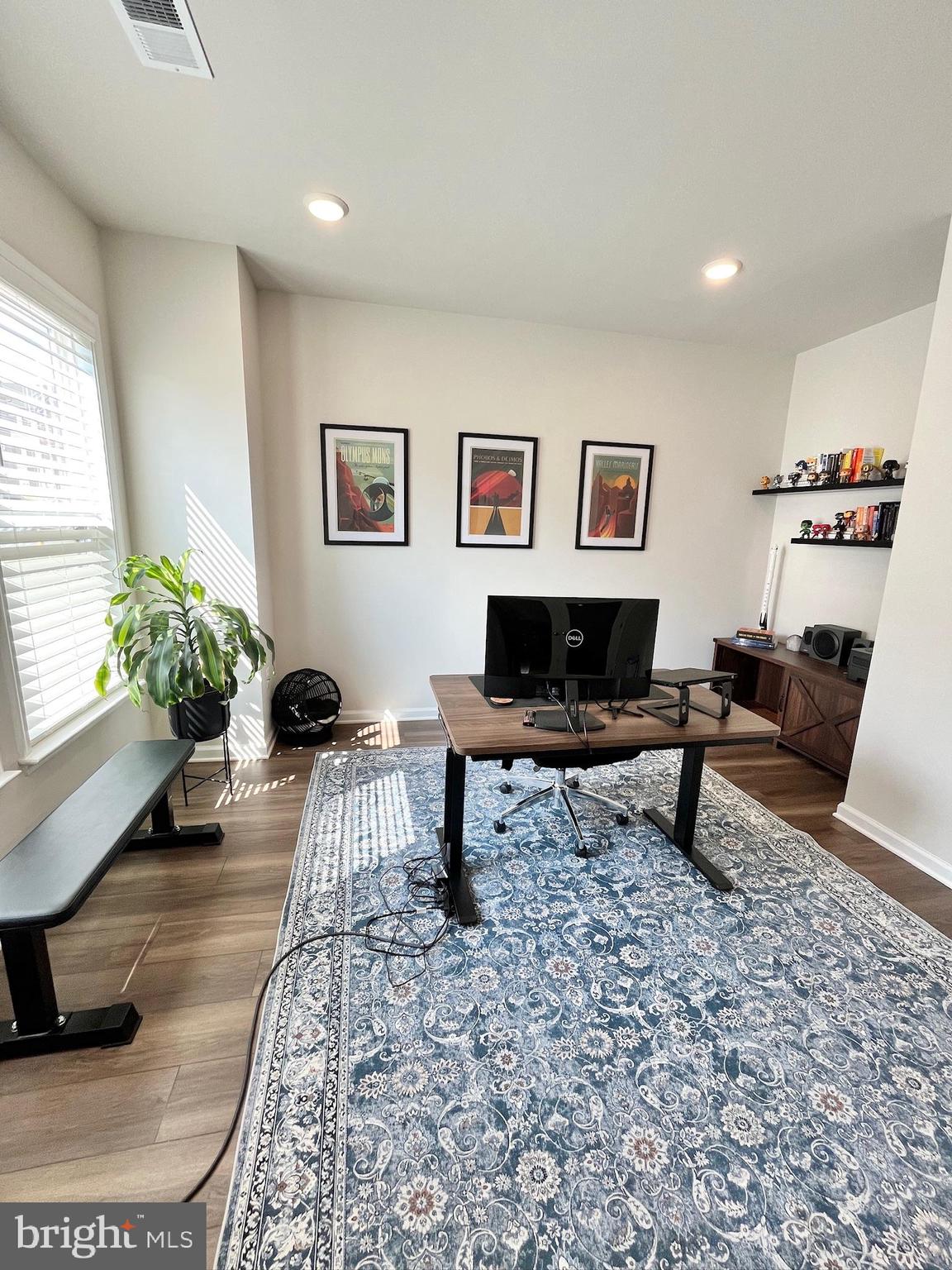 236 Mainstream Drive Laurel, MD 20724 - Photo 38 of 52 a living room with furniture and a rug