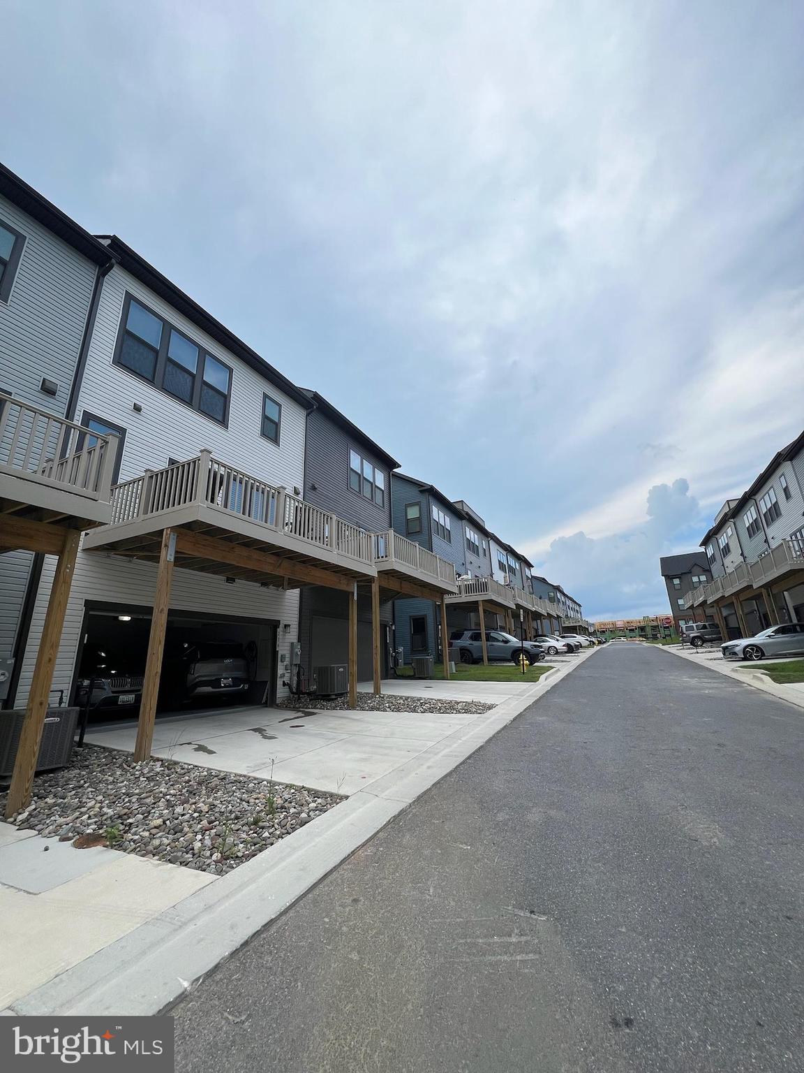 236 Mainstream Drive Laurel, MD 20724 - Photo 45 of 52 a view of a car park in front of house