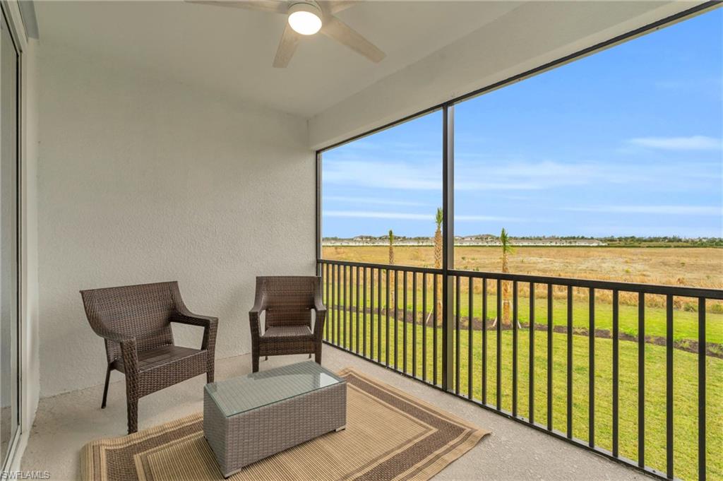 11811 Venetian Lagoon Drive, Unit 202 Fort Myers, FL 33913 - Photo 30 of 50 a view of a two chairs in the balcony