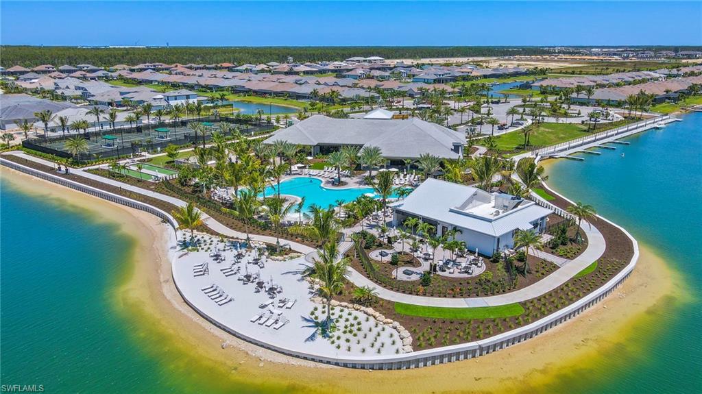 11811 Venetian Lagoon Drive, Unit 202 Fort Myers, FL 33913 - Photo 36 of 50 a view of a swimming pool with a lake