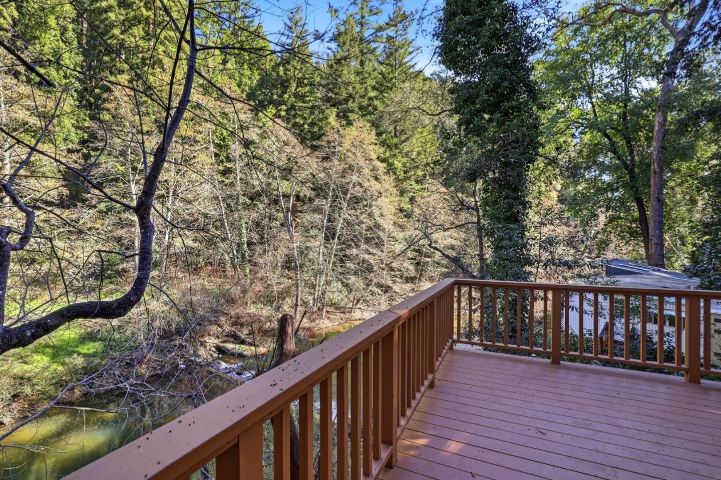 265 Brown Gables Road, Unit 11 Ben Lomond, CA 95005 - Photo 39 of 50 a balcony with wooden floor and fence