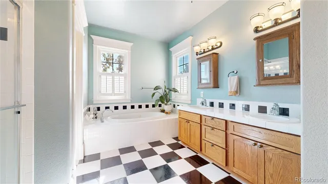a kitchen with a sink a stove and cabinets