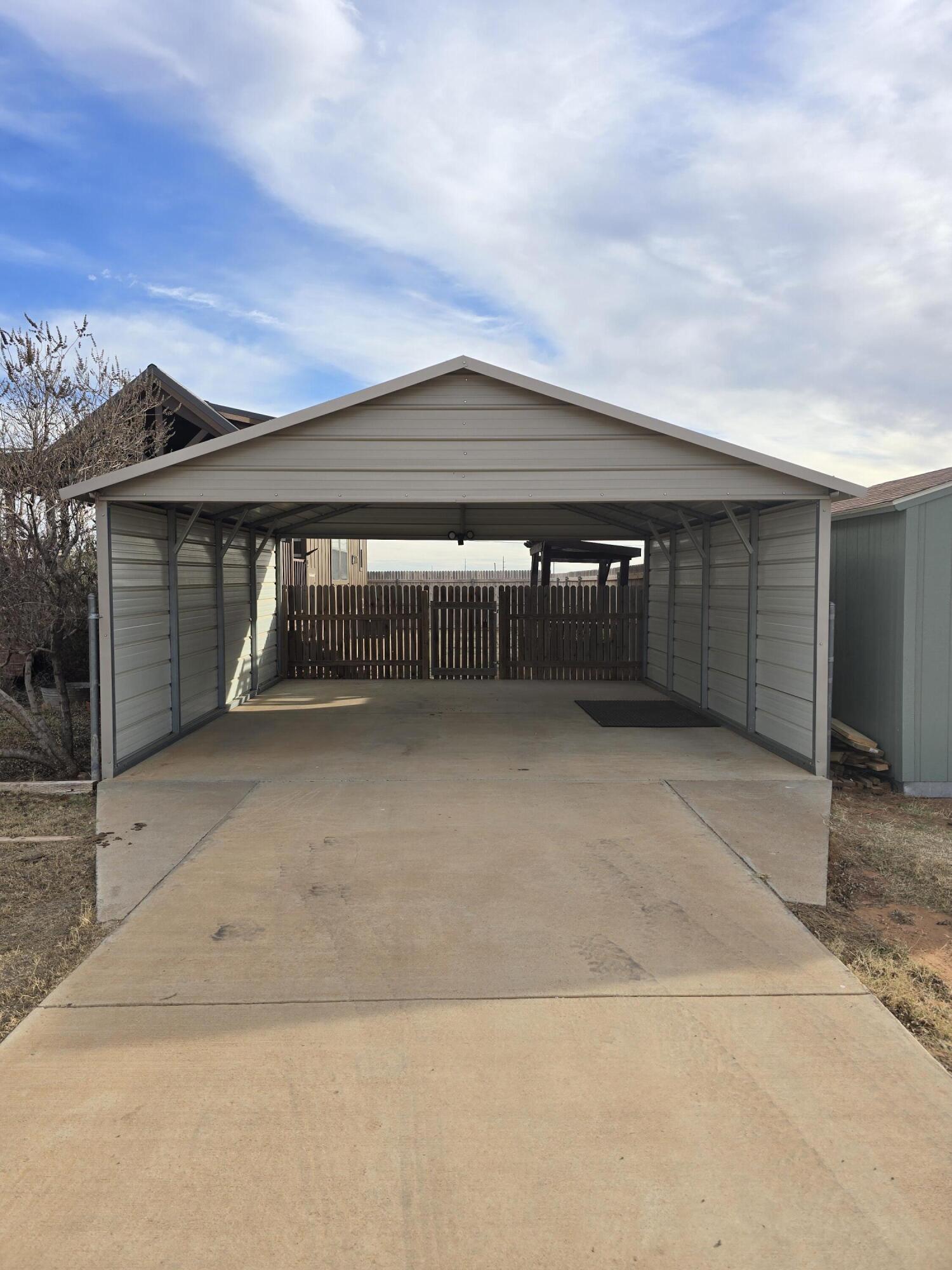 1023 County Road 20 Lamesa, TX 79331 - Photo 12 of 26 front view of a house with a garage