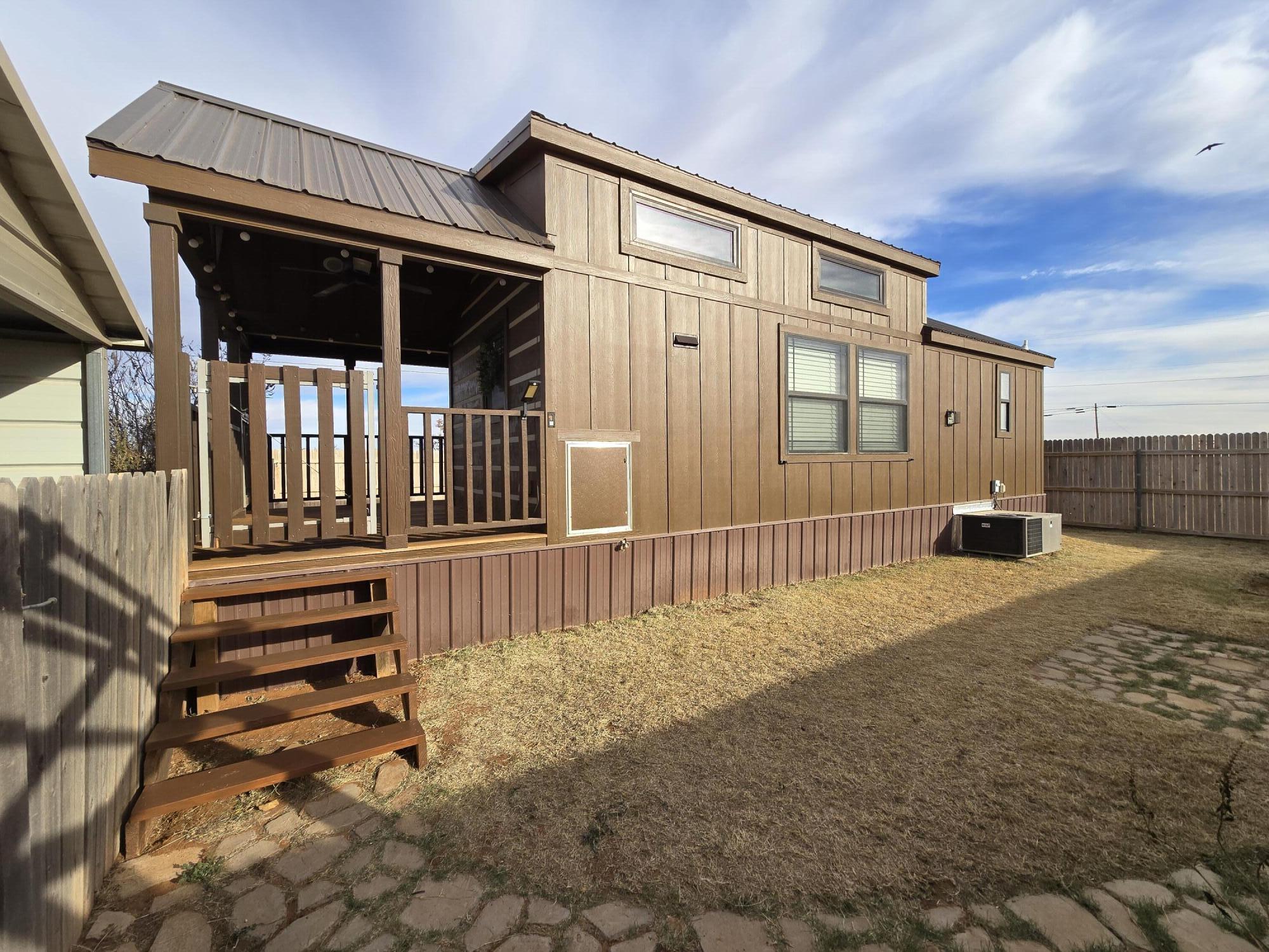 1023 County Road 20 Lamesa, TX 79331 - Photo 16 of 26 a front view of a house with a yard