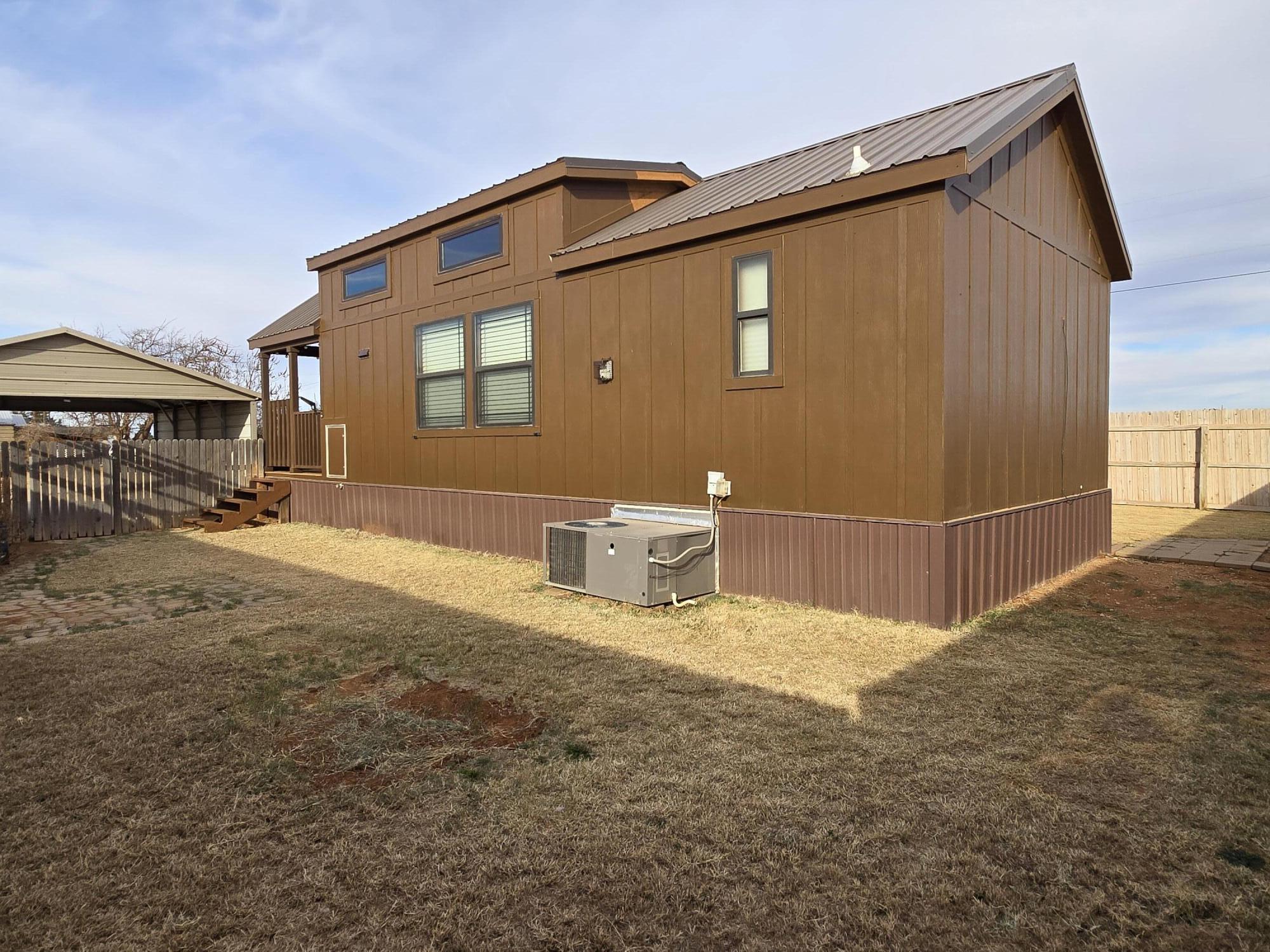 1023 County Road 20 Lamesa, TX 79331 - Photo 17 of 26 a view of backyard of the house