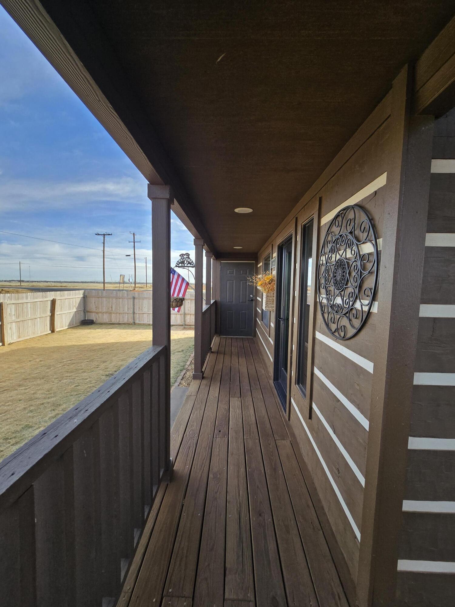 1023 County Road 20 Lamesa, TX 79331 - Photo 10 of 26 a view of entryway with wooden floor