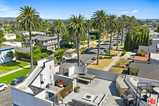 a view of yard with swimming pool and outdoor seating