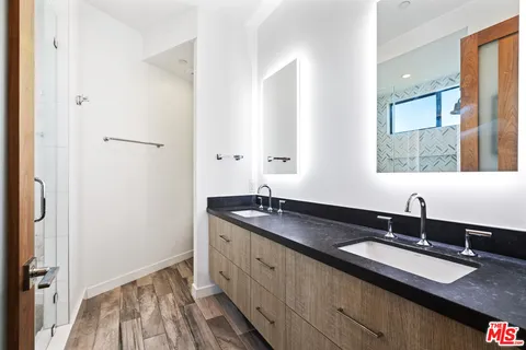 a aerial view of a house with street