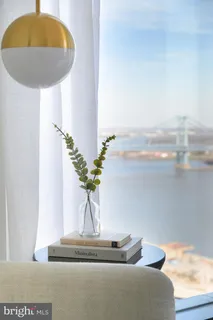 a vase of flowers sitting on a table