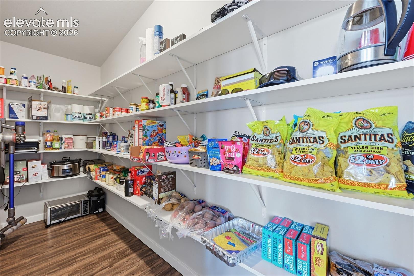 23335 Sanborn Road Calhan, CO 80808 - Photo 8 of 28 Oversized walk in pantry with exceptional storage space