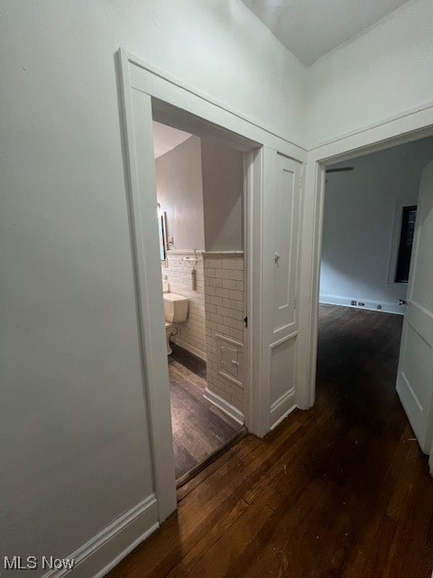 2915 Ludlow Road Cleveland, OH 44120 - Photo 40 of 50 Hall with dark wood finished floors and a wainscoted wall