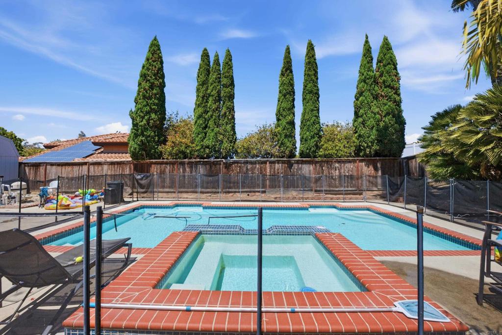 2077 Westwood Road Vista, CA 92083 - Photo 30 of 37 a view of swimming pool with chairs