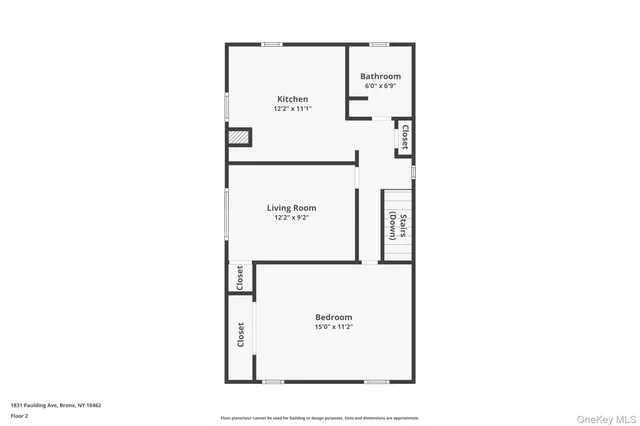 a picture of a bench in front of a wall