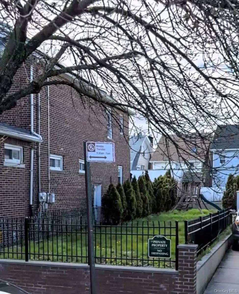 1831 Paulding Avenue Bronx, NY 10462 - Photo 2 of 10 a front view of a house with a garden