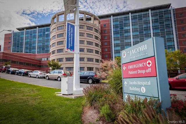 a sign that is on a brick building