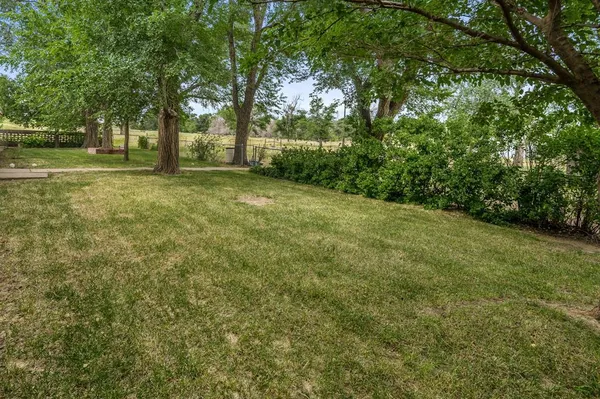 a view of outdoor space with deck and yard