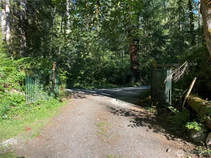a view of backyard with green space