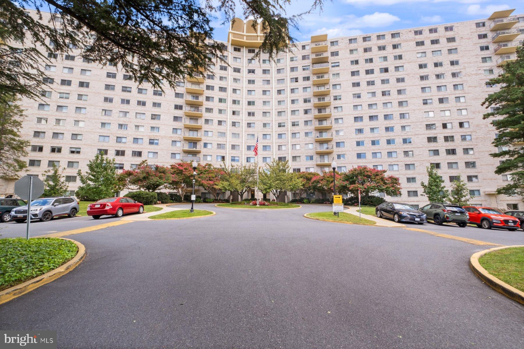 1111 University Boulevard West, Unit 817 Silver Spring, MD 20902 - Photo 2 of 26 a view of a street with cars