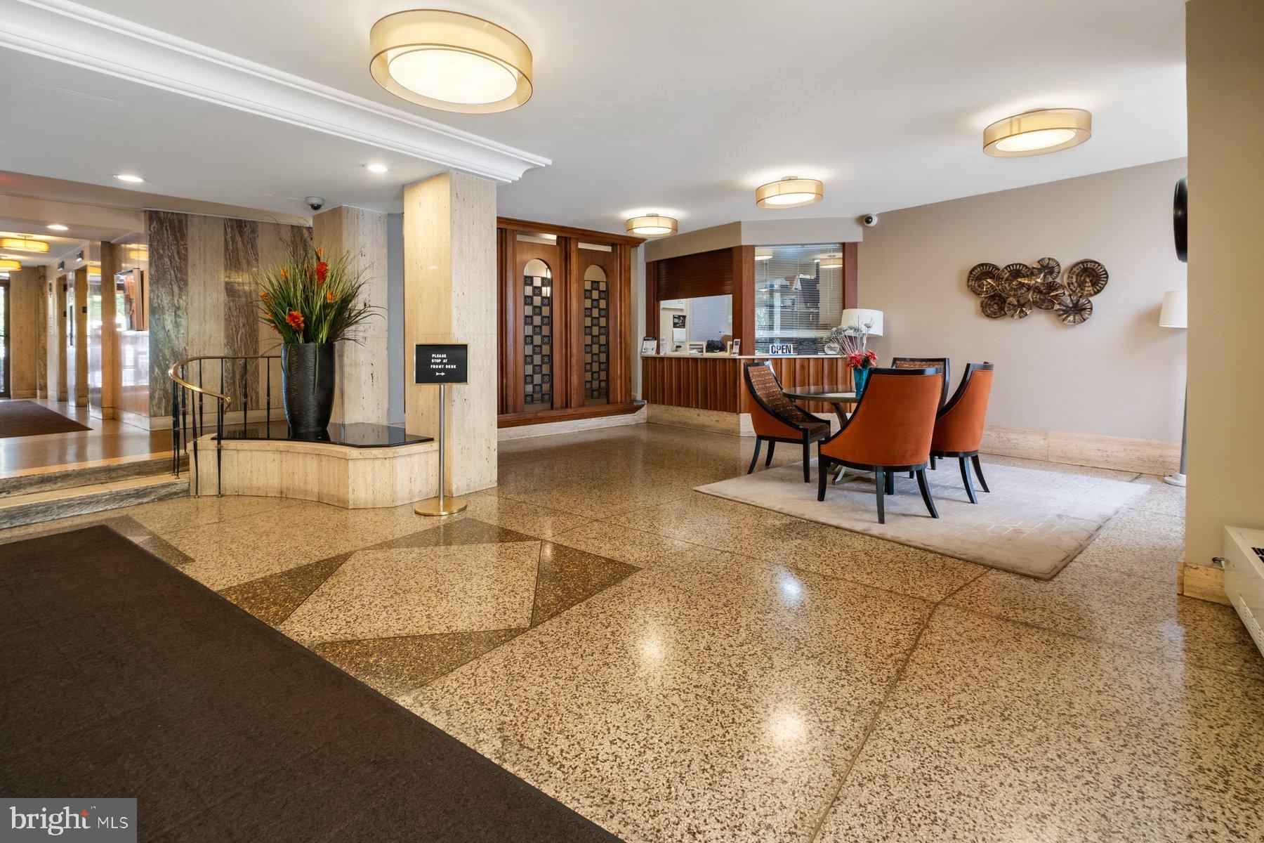 1111 University Boulevard West, Unit 817 Silver Spring, MD 20902 - Photo 25 of 26 a living room with furniture and a large window
