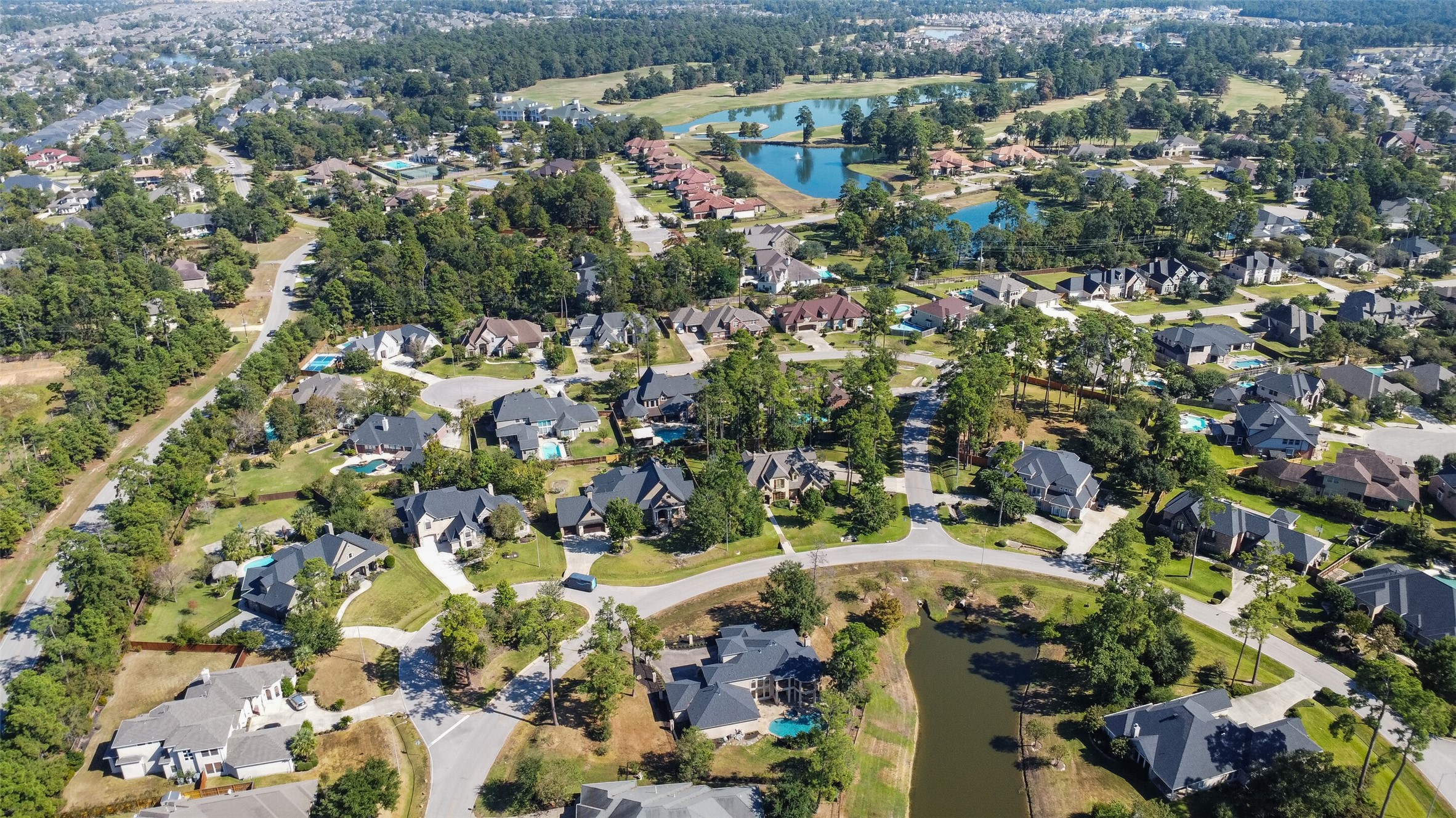 8114 Hideaway Lake Circle Spring, TX 77389 - Photo 49 of 50 an aerial view of residential houses with outdoor space and trees