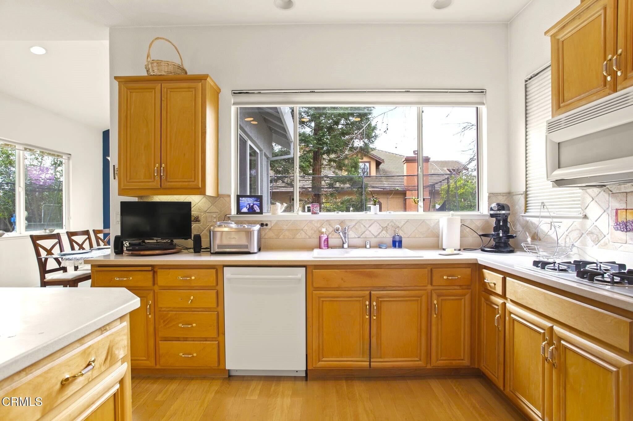 1888 Renee Way Concord, CA 94521 - Photo 25 of 75 a kitchen with a sink stove and cabinets