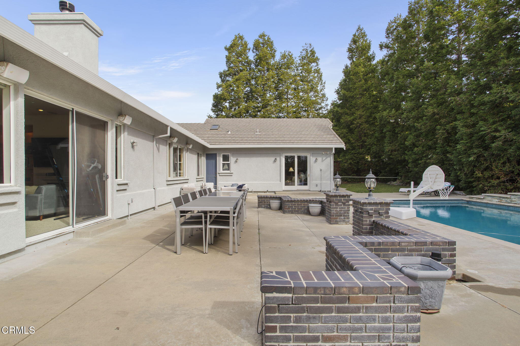 1888 Renee Way Concord, CA 94521 - Photo 56 of 75 a view of a patio with table and chairs and a barbeque with potted plants