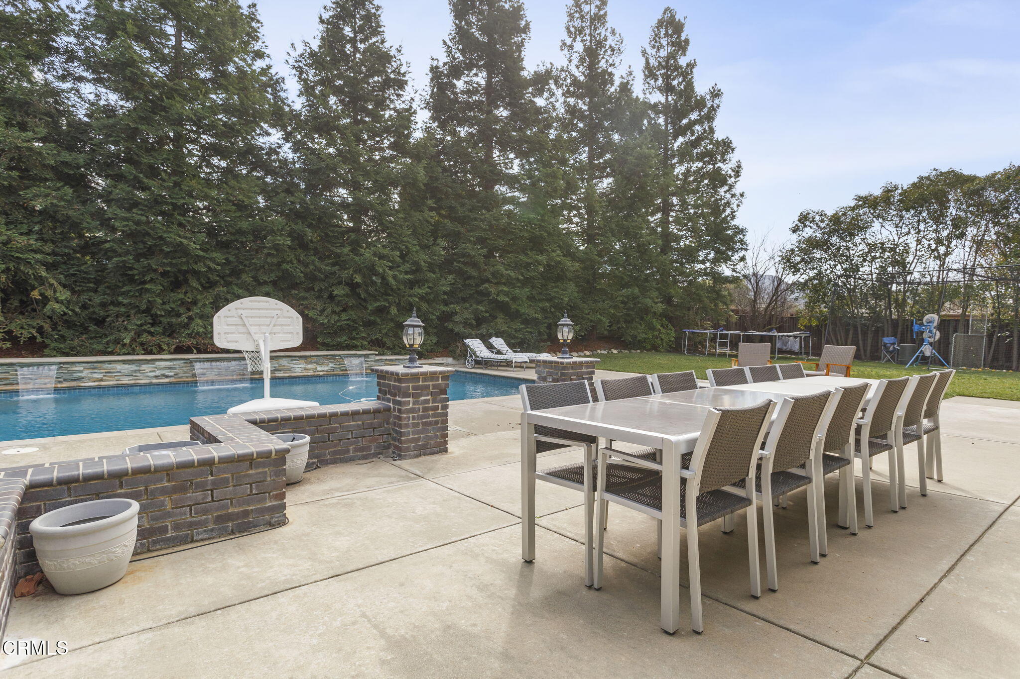 1888 Renee Way Concord, CA 94521 - Photo 65 of 75 a view of a patio with a dining table and chairs with a fire pit