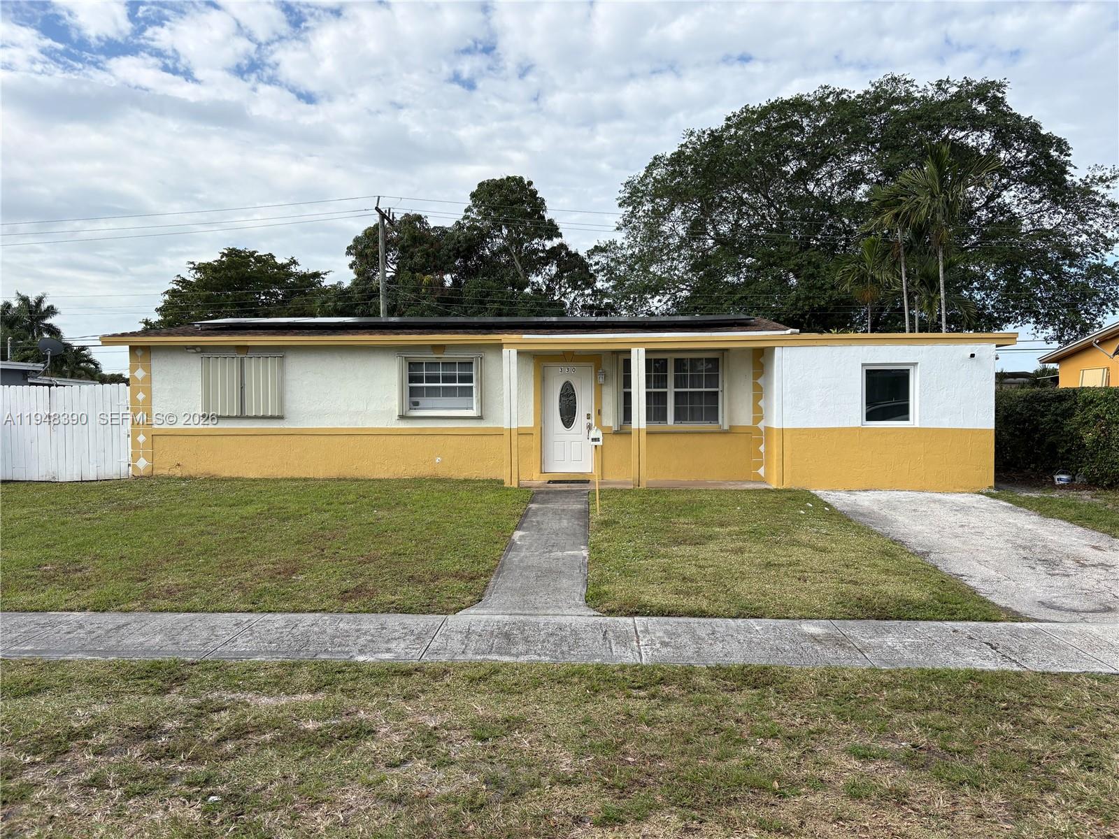 a front view of house with yard