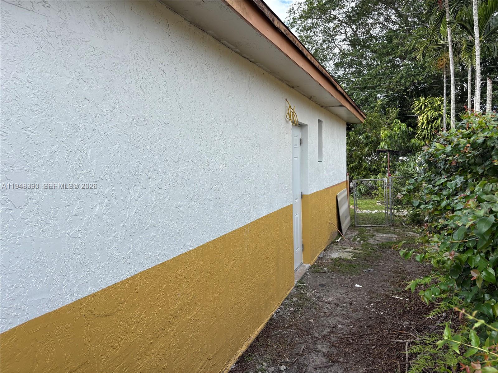 330 North 69th Way Hollywood, FL 33024 - Photo 17 of 20 a view of a backyard with plants