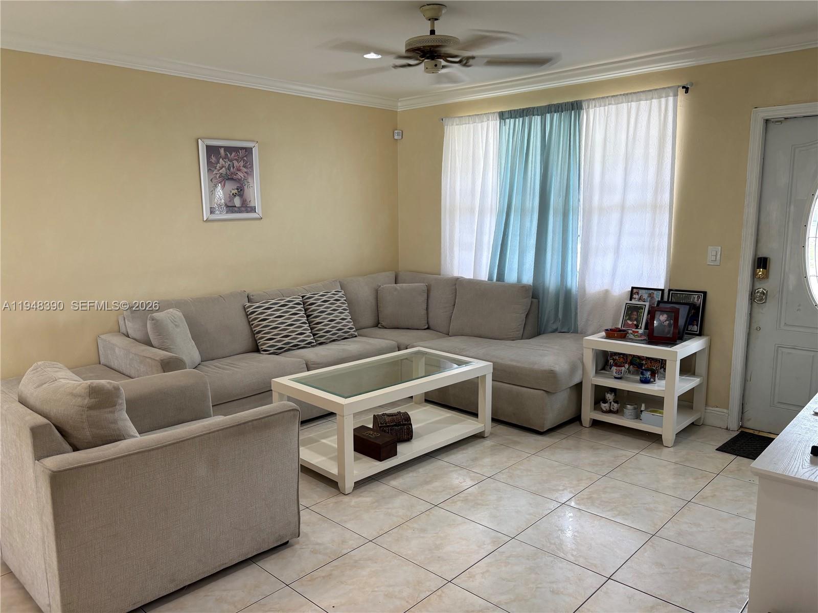 330 North 69th Way Hollywood, FL 33024 - Photo 3 of 20 a living room with furniture and a window
