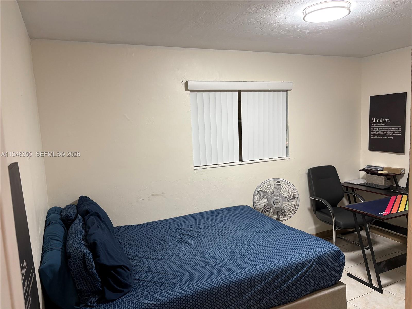 330 North 69th Way Hollywood, FL 33024 - Photo 10 of 20 a room with a bed and a window