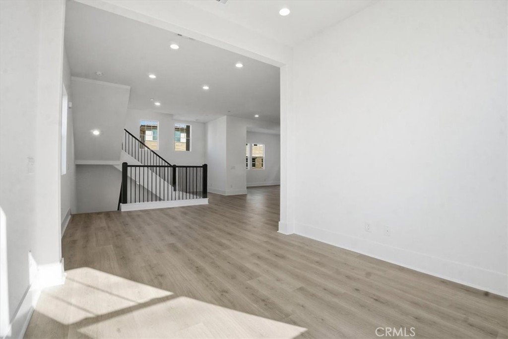 8 Remy Lane Montebello, CA 90640 - Photo 15 of 61 a view of empty room with wooden floor