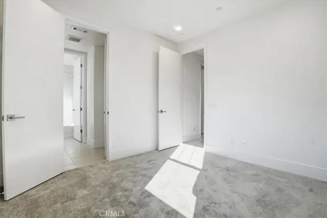 a bathroom with a shower and a toilet