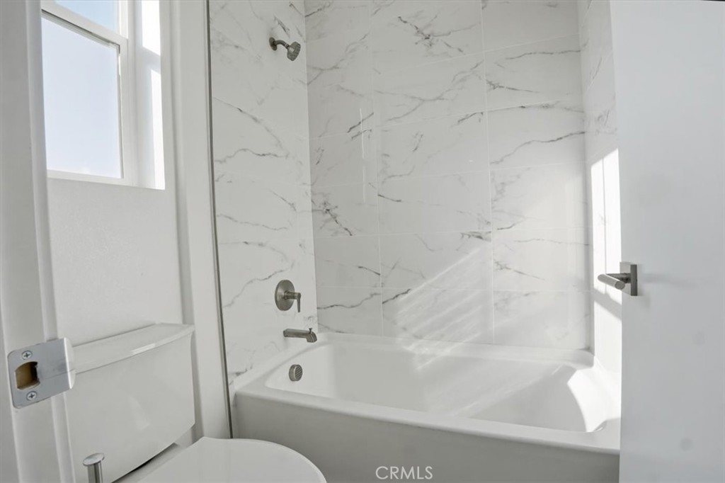 8 Remy Lane Montebello, CA 90640 - Photo 20 of 61 a bathroom with a shower and a toilet